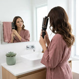 Auto Rotating Hair Curler in use