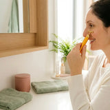 Luxe 24k Gold Eye Face Massager in use