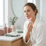 Skin Rejuvenation Thermal Massager in use