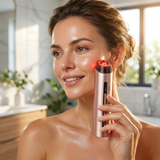 Woman using microcurrent red light face lift tool